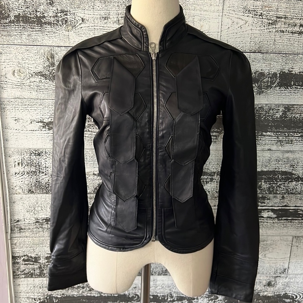 L.A.M.B. Genuine Leather dark blue fitted jacket.